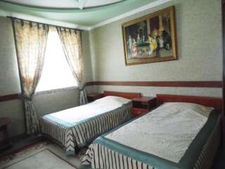 Гостиница Орион Домбай Улучшенный двухместный номер с 2 отдельными кроватями-1